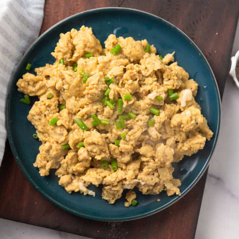 cajun scrambled eggs with garnishing in a top view