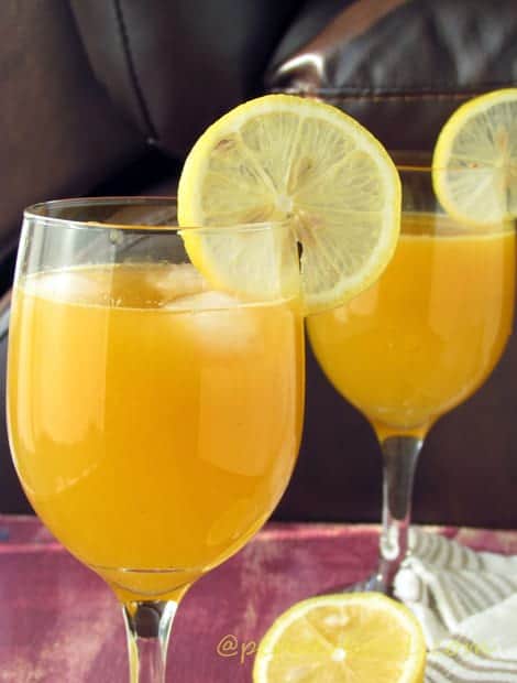 Orange punch for kids birthday parties or baby shower. A non alcoholic summer drink. A easy holiday fun recipe- The best healthy punch ever! Simple, refreshing and energetic drink for winter as well!