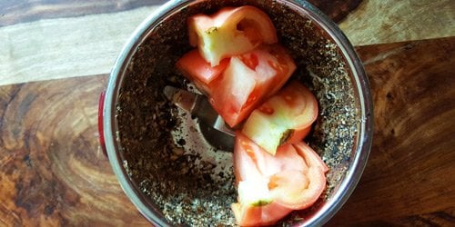 Add 1 tomato(chopped) on the same grinder container