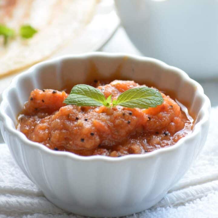 instant tomato chutney placed in a small pinch bowl