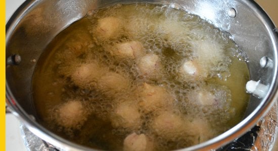 Hear oil in pan, drop batter into small balls. 