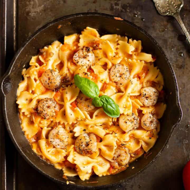 Shrimp Bruschetta Pasta placed in a cast iron skillet