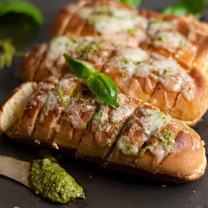 Basil pesto Bread roll served in a tray