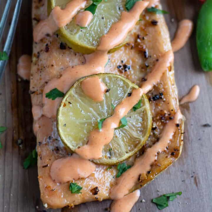 Grilled Cedar Plank Salmon recipe, yields soft, juicy smoke flavored salmon with the right hint of herbs. The salmon great in taste and texture something similar to the restaurant's quality.
