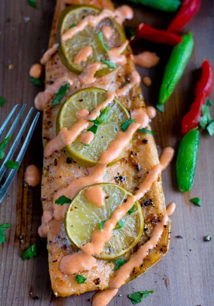 Grilled Cedar Plank Salmon recipe, yields soft, juicy smoke flavored salmon with the right hint of herbs. The salmon great in taste and texture something similar to the restaurant's quality.