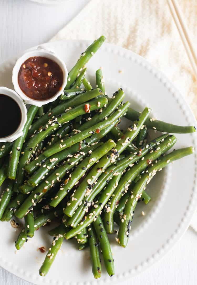 Spicy Chinese green beans, an easy recipe made with soy sauce. This is an Asian style spicy and healthy stir fry. I'm sure your family will love this low carb, vegan dish. It simple and tastes heavenly. Best to serve with fried rice.