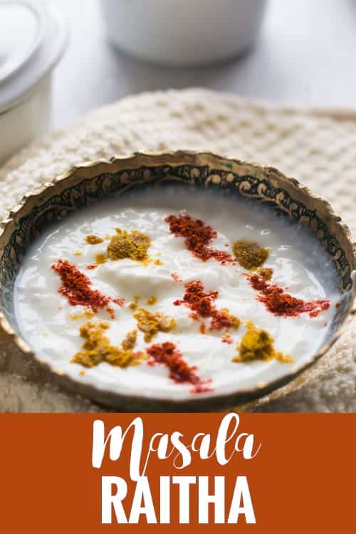 Masala Raita Recipe, made with curd/yogurt and with spices like roasted cumin powder, chili and coriander powders. It's an instant and quick Indian recipe best to serve for rice, roti or Biryani.