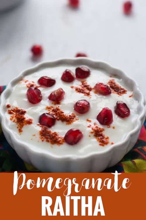 Pomegranate Raita made with yogurt / curd, fresh pomegranate arils and chili powder. This recipe is simple and quick to make. This raita tastes ultimately delicious and it is creamy, sweet and also spicy. Perfect to serve as side dish for rice or roti.