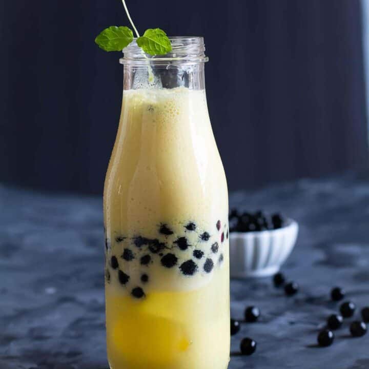 mango boba smoothie in a drinking glass