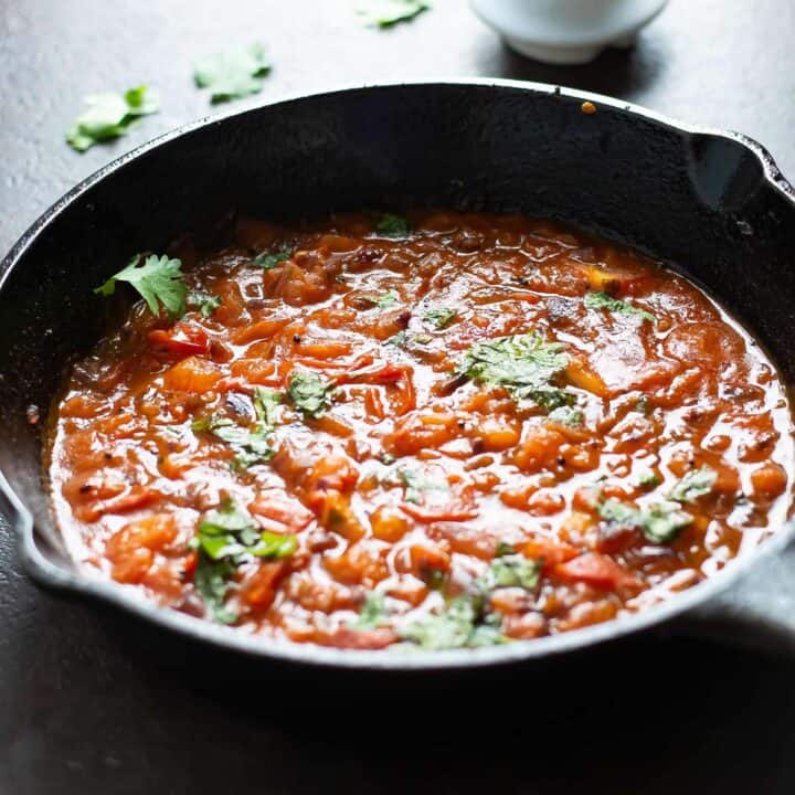 tomato thokku served in a skillet