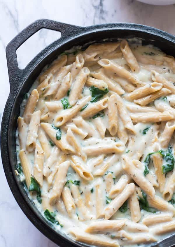 Vegan spinach pasta recipe can be made in a single pan where the coconut milk is the main ingredient for the alfredo sauce. This recipe has a rich, creamy gravy with garlic and spinach.
