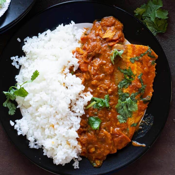 Easy Indian salmon curry recipe made spicy with chili powder, tomatoes, and onion. This is an easy weeknight meal