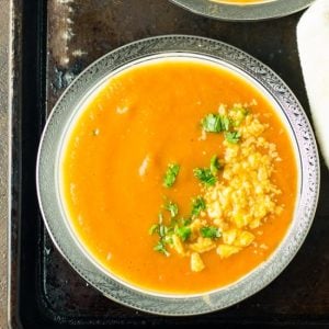 Vegan roasted tomato soup with Instant Pot is a simple, healthy and most comforting soup.  This is the easy homemade soup is dairy-free, paleo, whole 30, keto with oven roasted tomato, onion and garlic. Perfect to serve for lunches or weeknight dinners. This recipe is a lazy man's Instant pot recipe for the creamy roasted tomato soup.