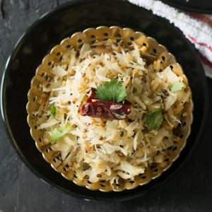 Cabbage poriyal-Indian style cabbage stir-fry made with shredded cabbage, shredded coconut and seasoned with mustard seeds. Another simple everyday side dish recipe made in less than 15 minutes from scratch.