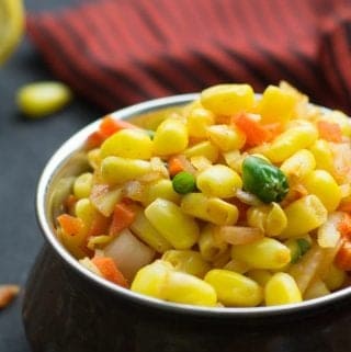 Corn chaat is actually a spiced Indian corn salad. One of the most popular Indian street food recipes made with delectable blend of chopped onion, tomato, green chili. A splendid fusion recipe of corn made in Indian style