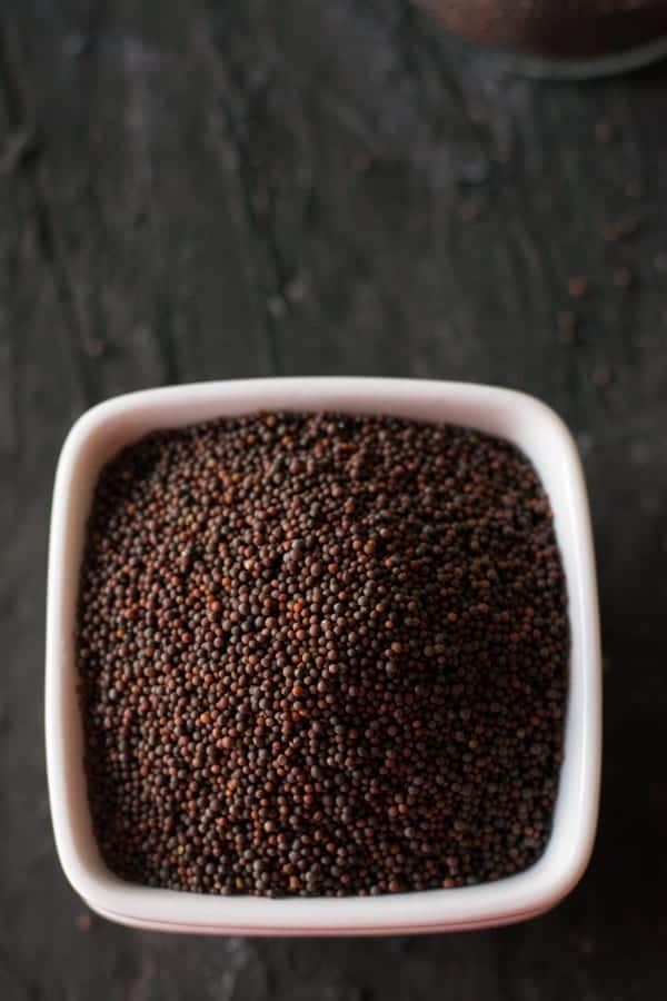 A mustard seed is one of the most commonly used ingredients across worldwide. It's known for its distinctive, robust and nutty flavor which is widely used in Indian cooking as well.