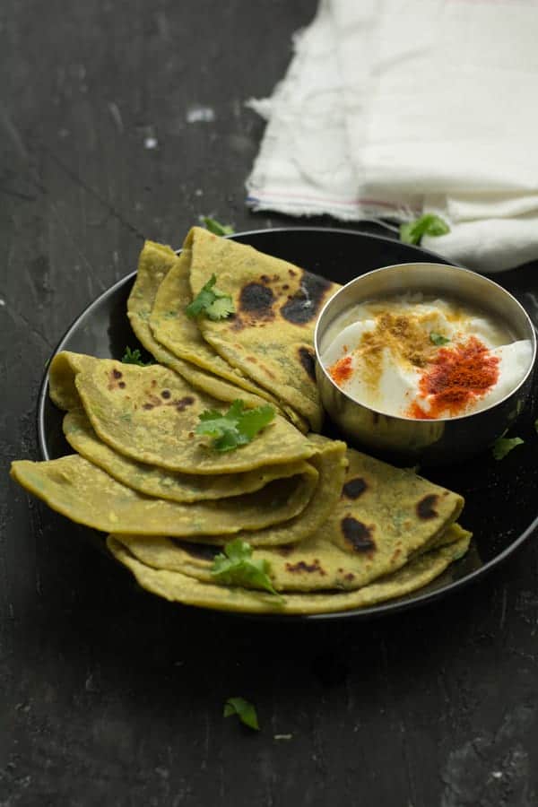 Avocado Paratha has neutral flavor, taste and looks green in color. While tasting no one can predict the ingredient of the paratha unless you disclose them. Accordingly, this became one of the tasty paratha recipes for lunch box and one of the easy avocado recipes for kids.