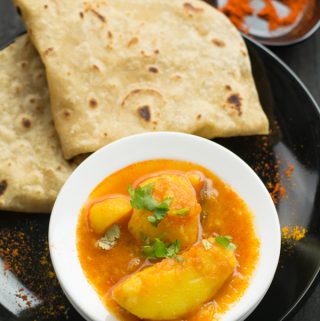 simple Instant pot potato curry is best to serve with idli, dosa, roti or puri