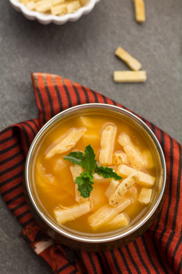 Serve this tomato clear soup as a mid-day beverage: I'm not obsessed with coffee or tea. So I always try to find other varieties of beverages that make me thrive all day long. 