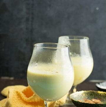 Today we are talking about the luxurious and traditional drink recipe of India-Badam milk. This almond milkshake is made with milk,almonds, cardamom. The milkshake recipe bursts with bright yellow color.