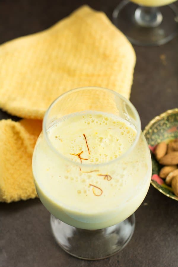 badam milk is a milkshake make with almond paste. This full filling drink is called as Kesar badam milk, where Kesar means saffron. An authentic recipe of India for centuries. 