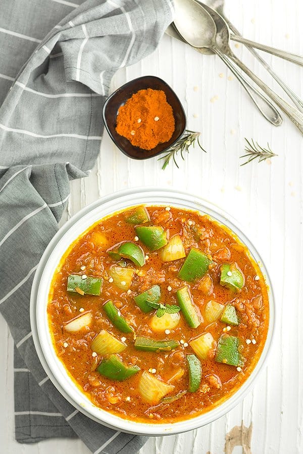 this flavorsome capsicum curry or green pepper curry however you call it. This is very simple and brings home the Indian restaurant. This capsicum masala curry is good to serve with rice or roti or naan bread.