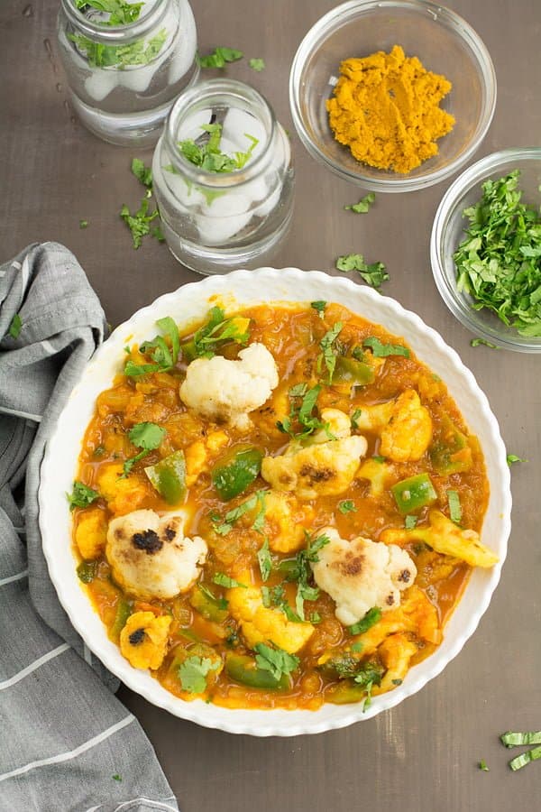 Indian cauliflower curry recipe is simple and delicious. Great to serve with rice and Indian flatbreads like roti or naan. One of the best Indian style recipe for cauliflower.