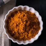 Turmeric in white bowl which is good for health
