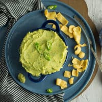 This green chili hummus is the delectable blend of healthy hummus from the middle eastern cuisine with the spicy Maxican's green chili.Ready in less than 10 minutes without using traditional tahini sauce