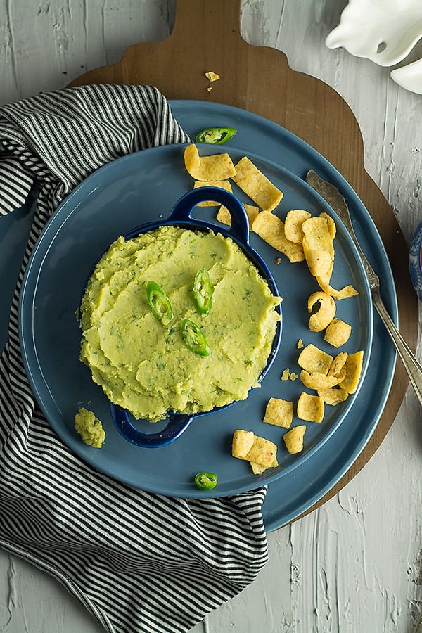 This green chili hummus is the delectable blend of healthy hummus from the middle eastern cuisine with the spicy  Mexican's green chili.Ready in less than 10 minutes without using traditional tahini sauce