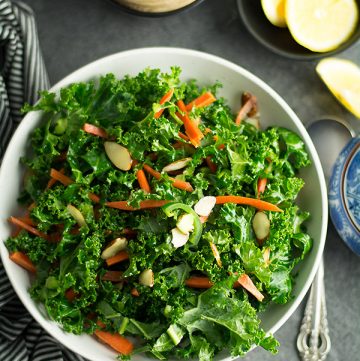 Spicy kale salad with lime vinaigrette dressing-healthy, delicious crunchy salad with finger-licking homemade lime vinaigrette. This spicy kale is the best of all recipes.