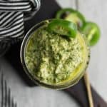 This spicy jalapeno pesto sauce is a vegan, low carb, and dairy-free recipe. This cilantro flavored pesto great with pasta, shrimp, and more.
