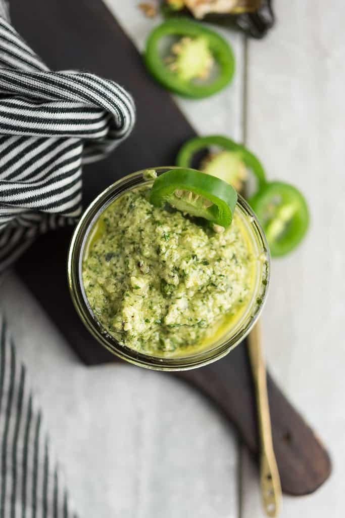 This spicy jalapeno pesto is a vegan, low carb, and dairy-free recipe. This cilantro flavored sauce great with pasta, shrimp, pizza, and more