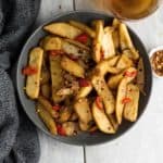 The Chinese French fries are coated with finger-licking hot and sweet Chinese sauce. A quick, easy, and delicious snack for the whole family.