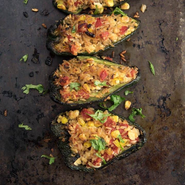 Tofu stuffed peppers are loaded with spices and meat-free. An excellent dish to enjoy as a classic appetizer or as a vegetarian dinner.