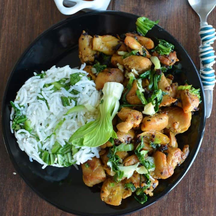 Sauteed bok choy chicken served with steamed white rice.