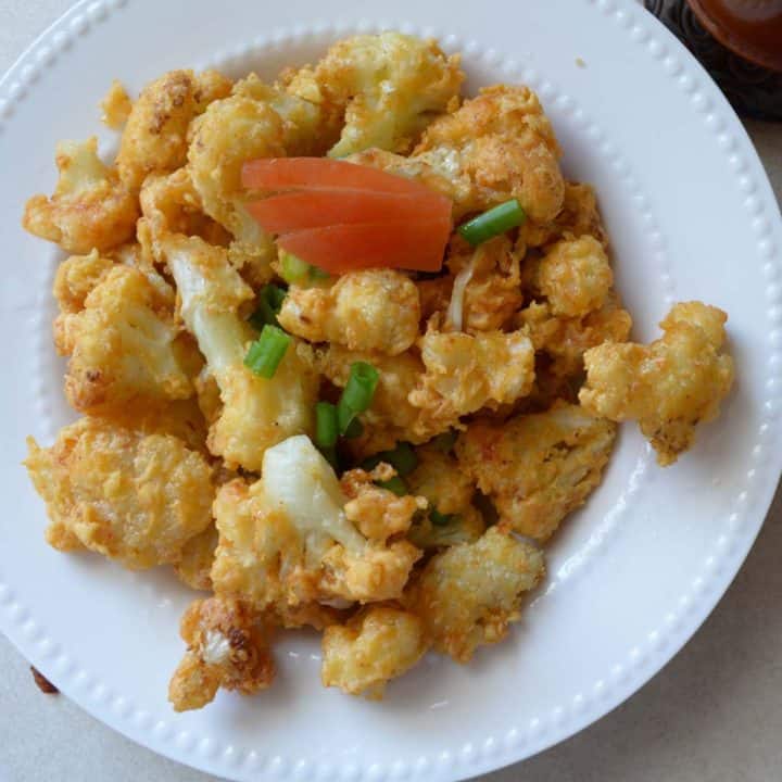 cauliflower golden fry served as appetizer.