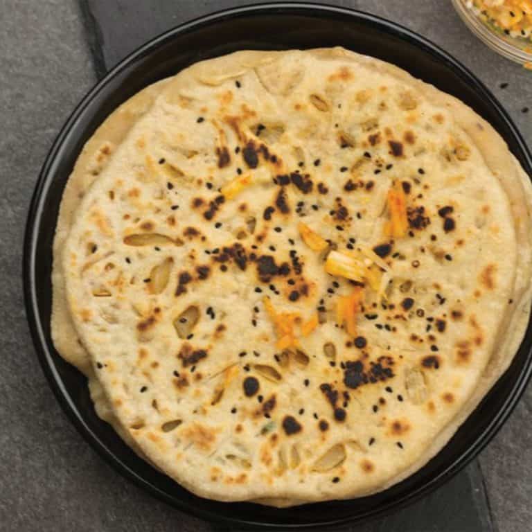 onion kulcha in a plate