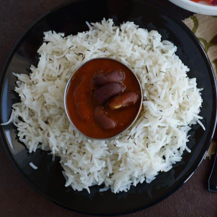 Rajma masala served over the bed if steamed rice.