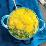 spicy mango sauce in a bowl with a spoon