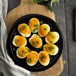 Spicy Cajun deviled eggs are excellent to serve as appetizers or snack. Spice up your holiday or potluck with delicious finger food recipe.