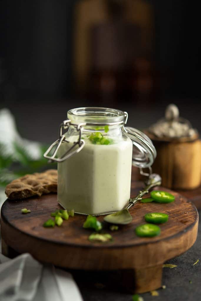 jalapeno ranch sauce is served with french fries.