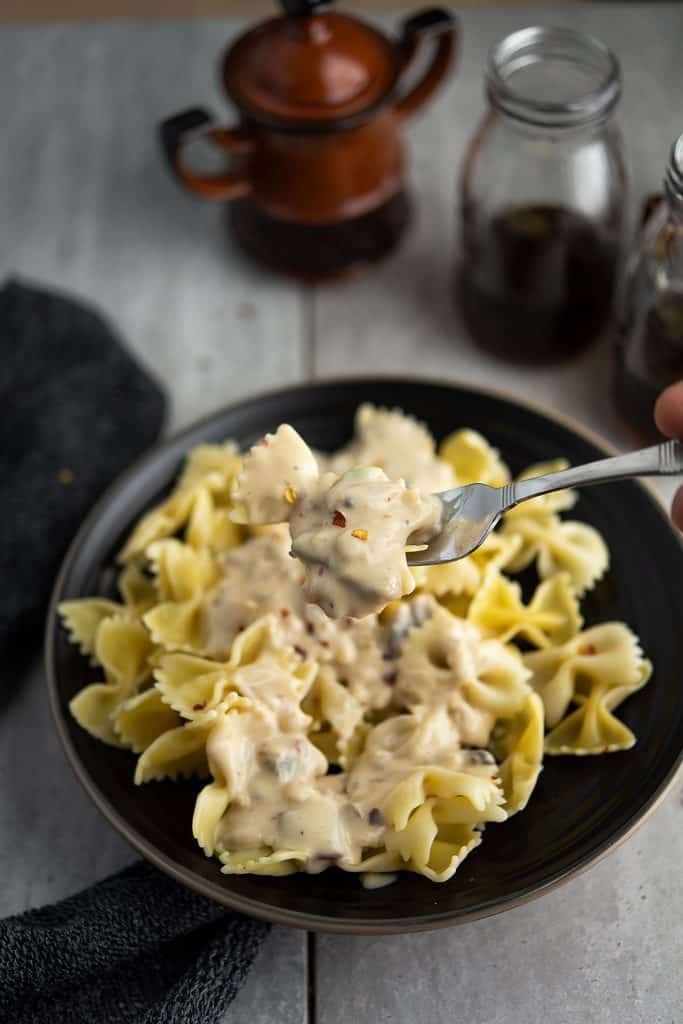 Hot and creamy white sauce served over pasta.