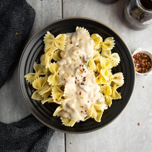 This spicy alfredo pasta sauce recipe yields creamy and mildly hot white sauce that's made with minimal ingredients, ready under 15 minutes.