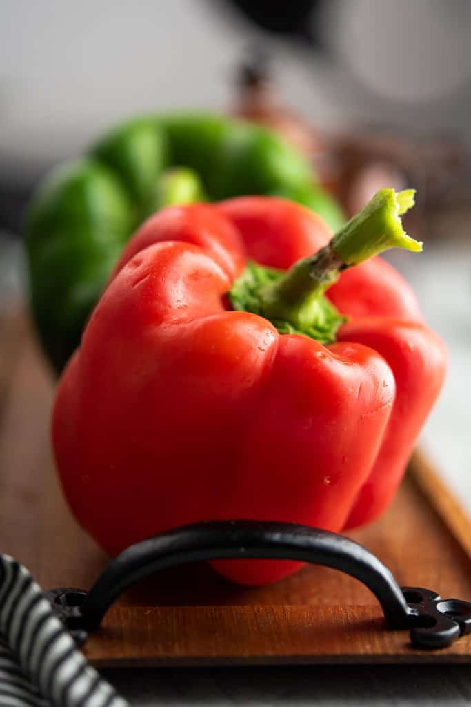 Bell peppers are placed in a serving tray.