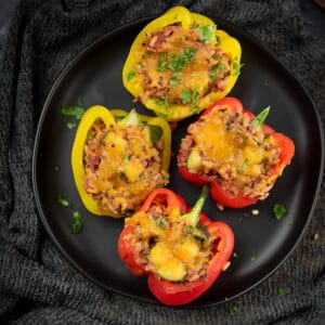 These stuffed salmon peppers are very easy and versatile. Made with zucchini, salmon, and brown rice, the combo with peppers tastes fabulous!