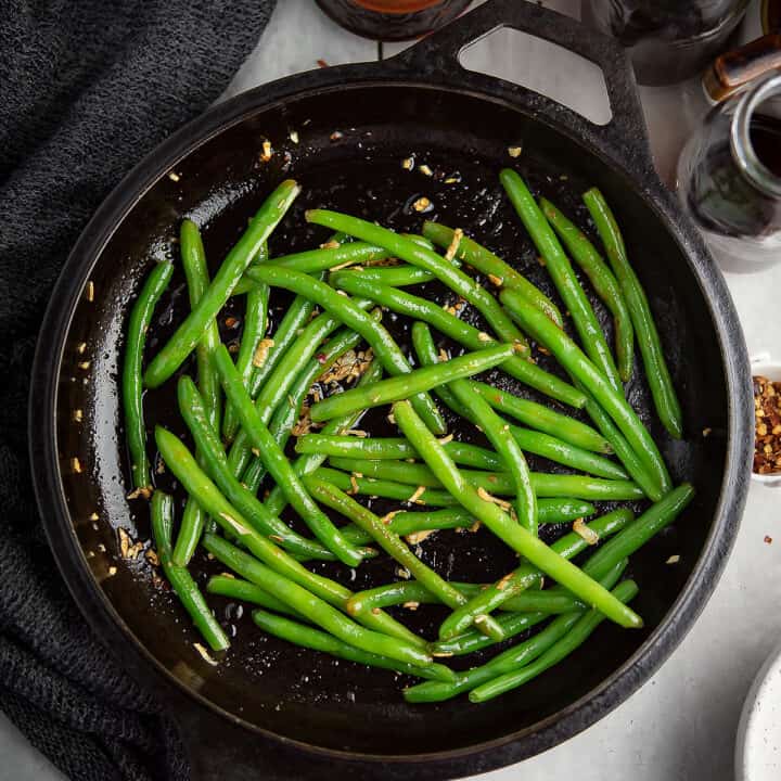 This spicy Sriracha green beans recipe is easy to put together under 20 minutes effortlessly-a quick option to serve a spicy side dish.