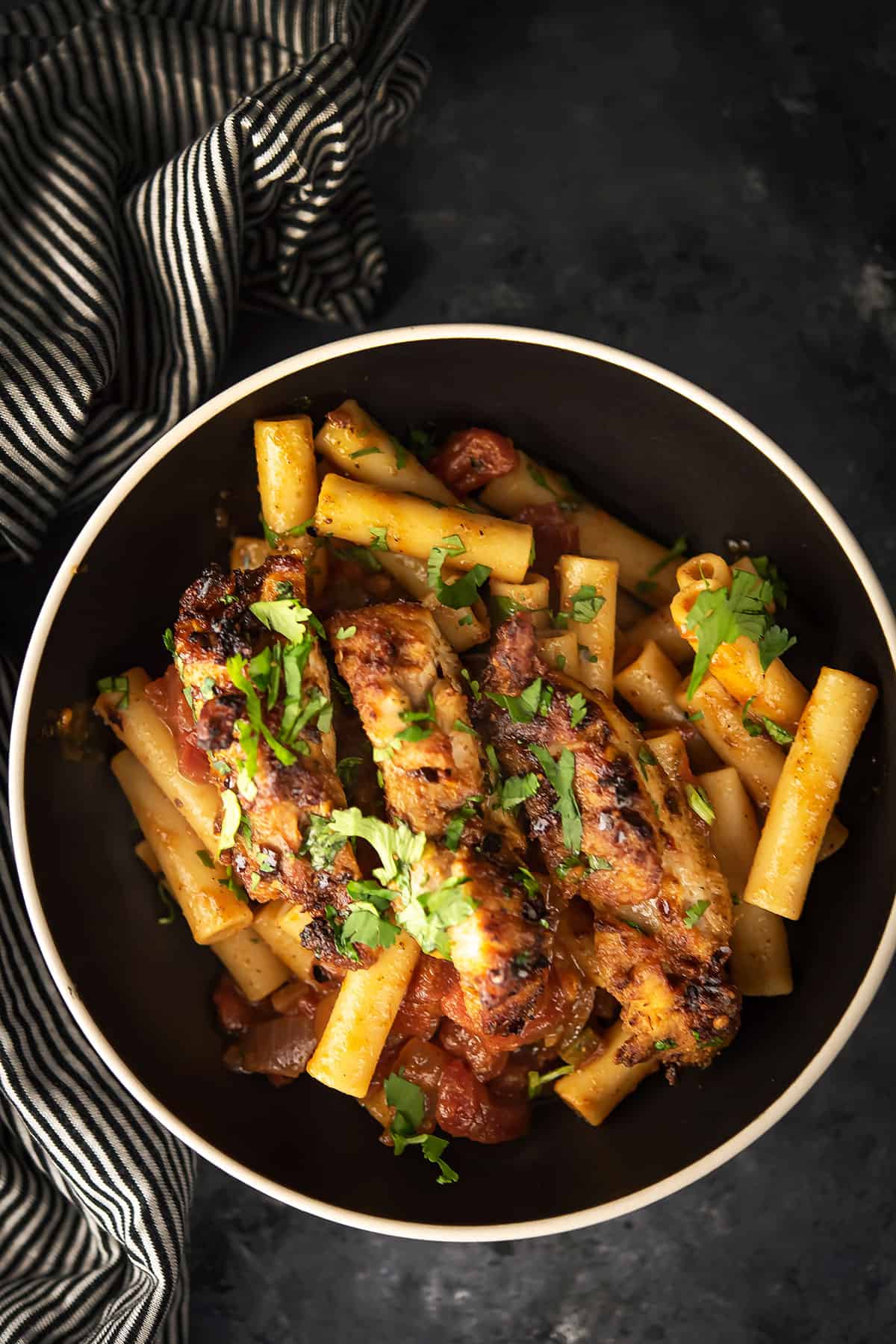 spiced chicken pasta served over the bowl