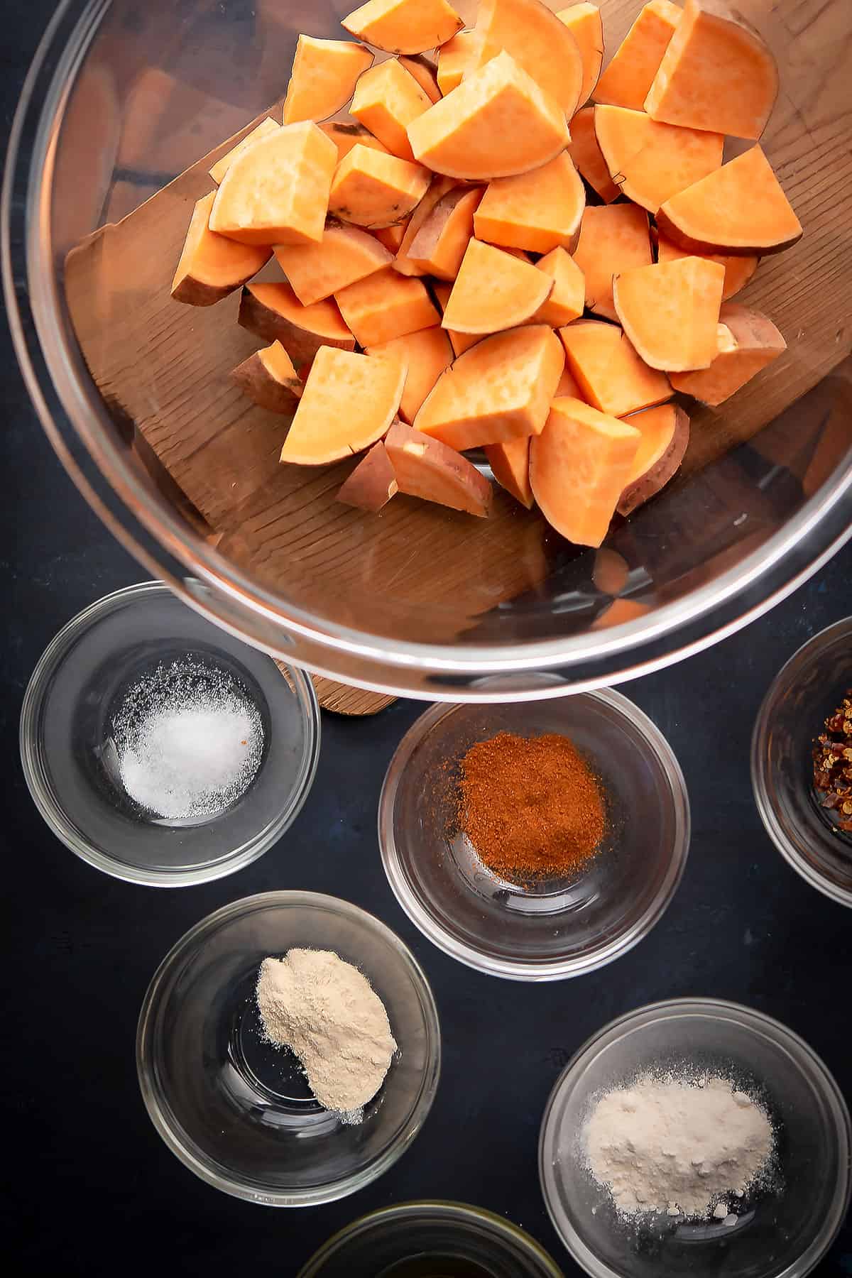 deiced sweet potato, and its spicy ingredients are placed in a bowl.