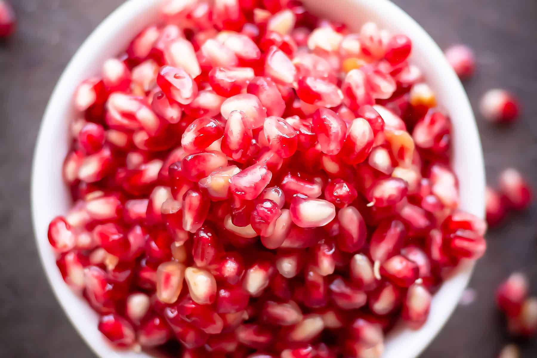 pomegranate pearls are kept ready in a bowl for making the punch